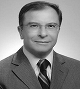 ERHAN TANJU